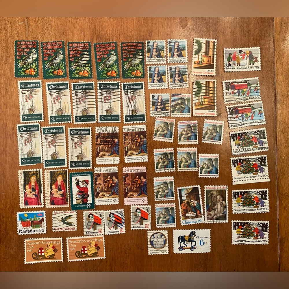 Vintage Christmas USA Postal Stamps over 50 postmarked. Collection philatelist